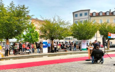 Roter Teppich für mehr Barrierefreiheit in Rosenheim